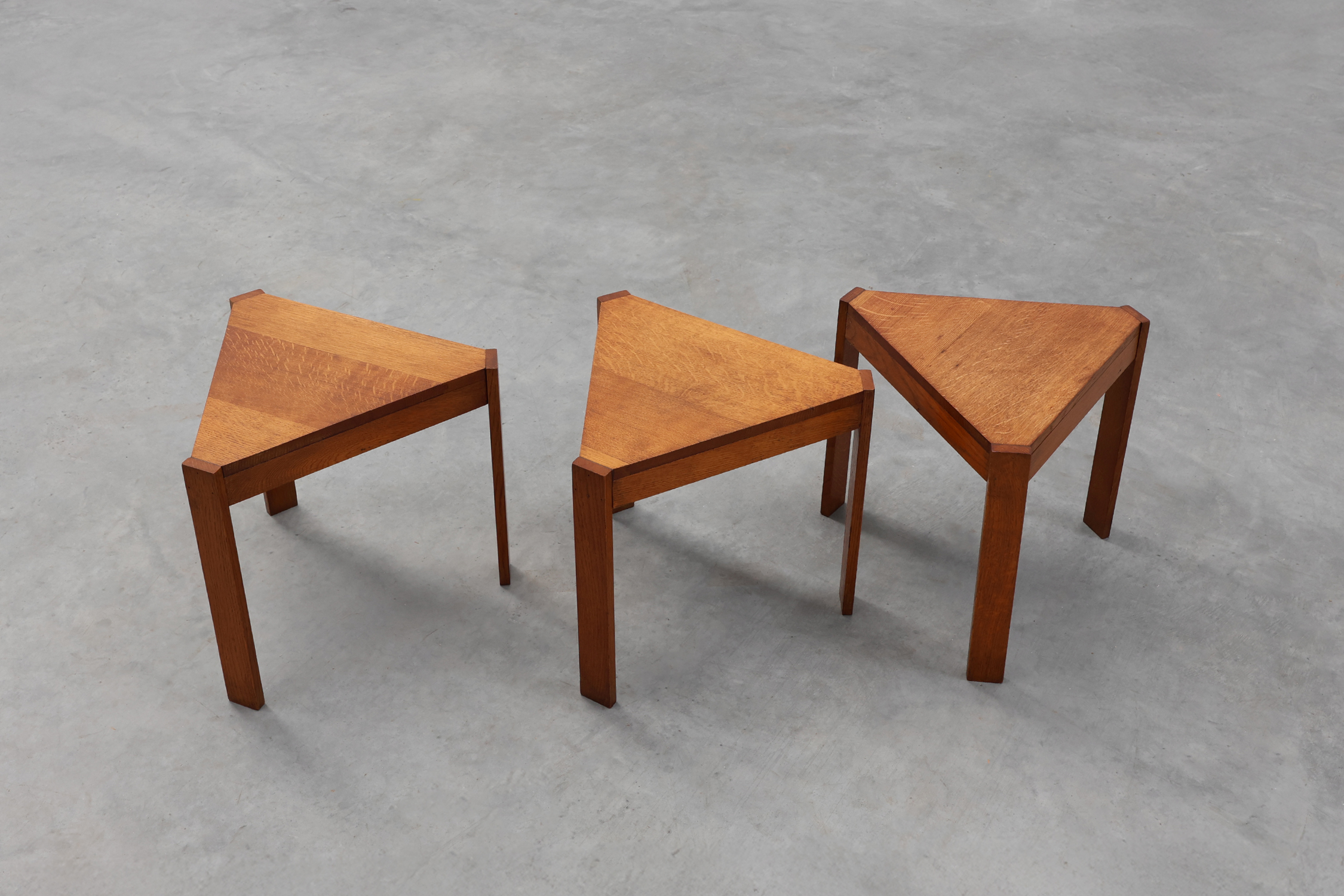 Set of 3 oak wooden triangular nesting or modular tables, France ca. 1960thumbnail